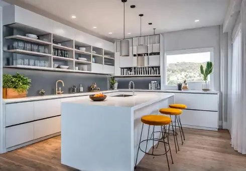 A brightly lit small kitchen with minimal countertop appliances open shelving andfeat